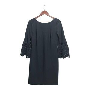 Dark blue dress with puff sleeves by Jessica Howard.  Size 6